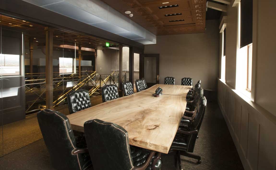 A boardroom flooded with natural light
